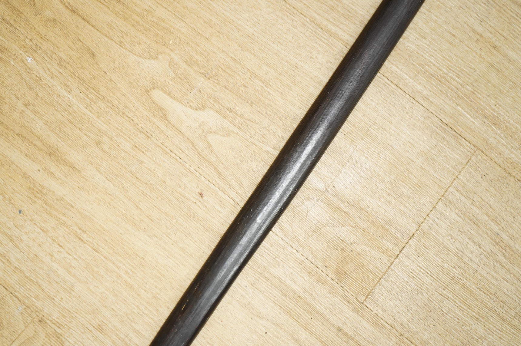 Papua New Guinea - a palm wood bow, 169cm long